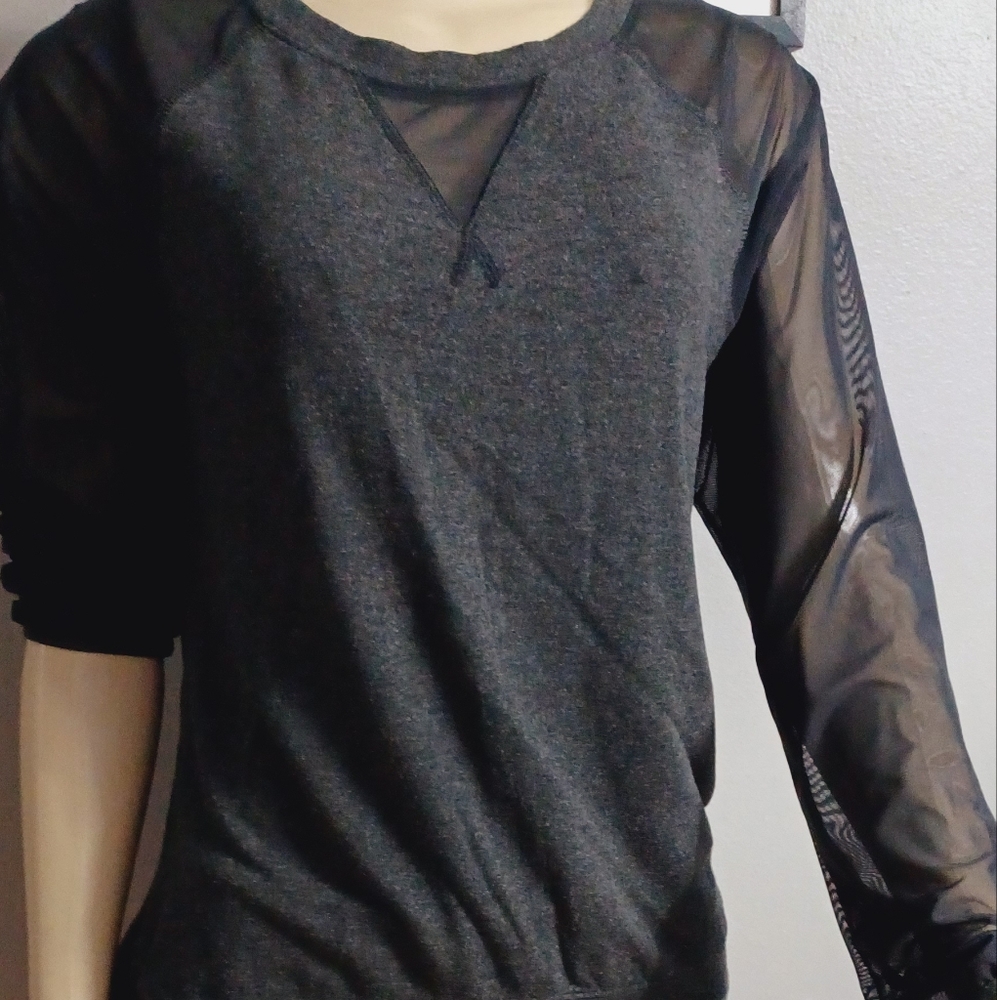 The North Face Long Sleeve Yoga pullover with open back and see through sleeves